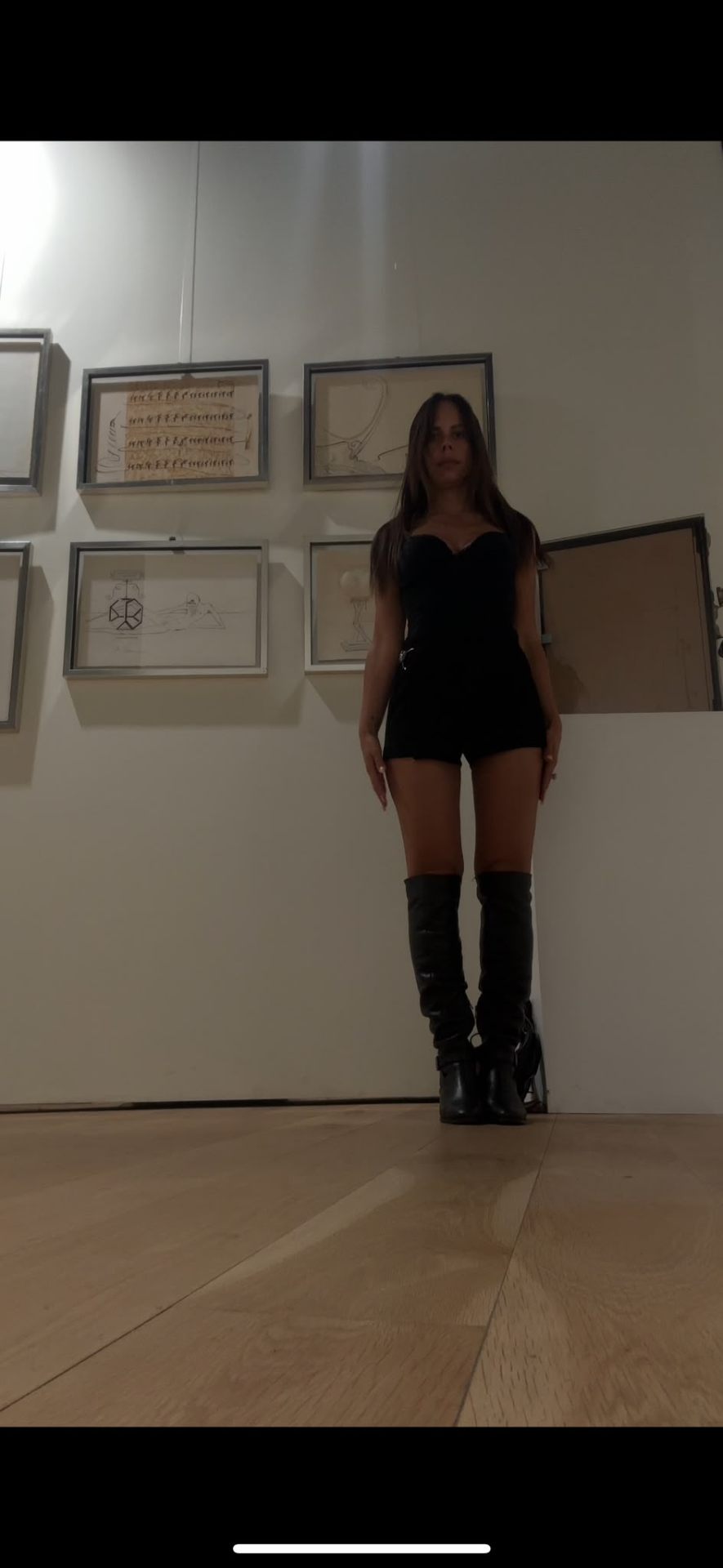 Dionne Gomes — full length in the Dalí gallery